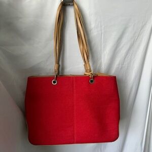 Medallion, red canvas purse with tan trim